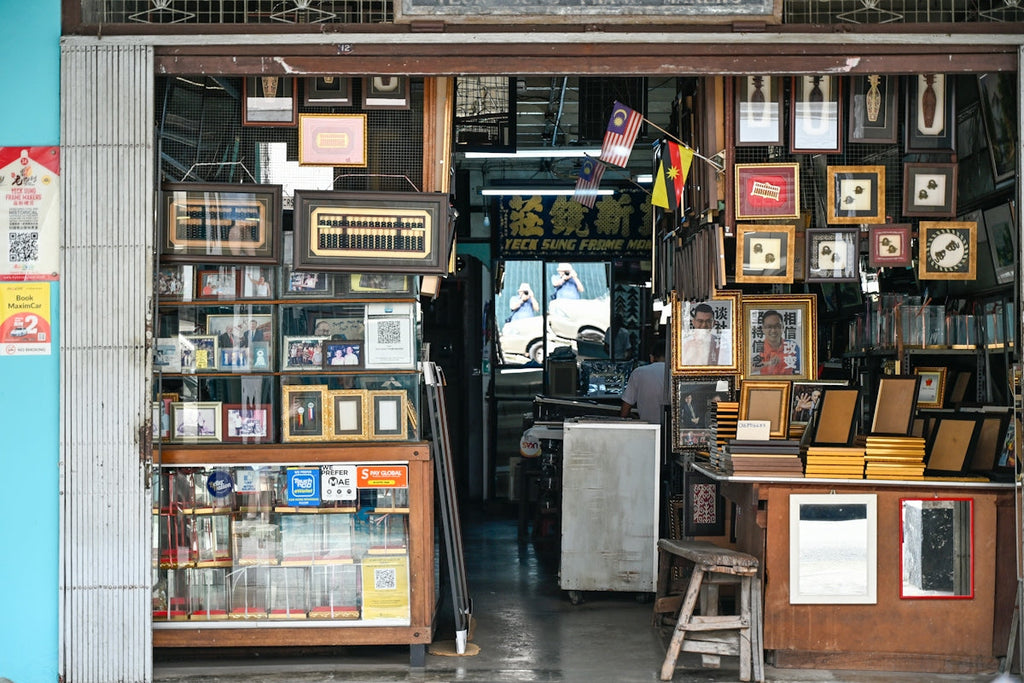A small shop selling framed pictures and curiosities